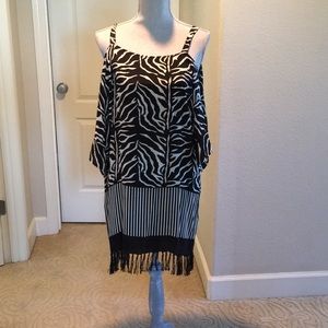 100% silk like new dress. Great look with a blazer